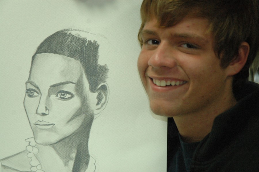 AP+Art+student+Tristan+Thompson%2C+a+senior%2C+focuses+his+theme+portfolio+on+people.+His+portrait+art+displays+the+detailed+features+of+his+images.+AP+Art+students+present+their+portfolios+in+May.