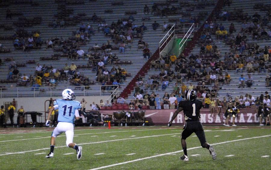 Senior wideout Michael Fine catches one of three touchdown passes against Lebanon, MO during the Hooten Classic held Sept. 1 at Reynolds Razorback Stadium. Photo by Brooke Schneider