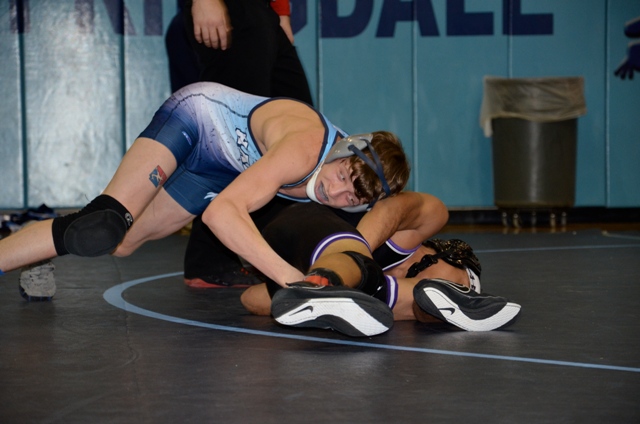 Taste of success pushes Collins, wrestling team