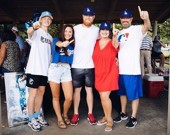 Former Wildcat Adam Scoggins celebrates with his family, the signing of a free agent deal with the Los Angeles Dodgers. 