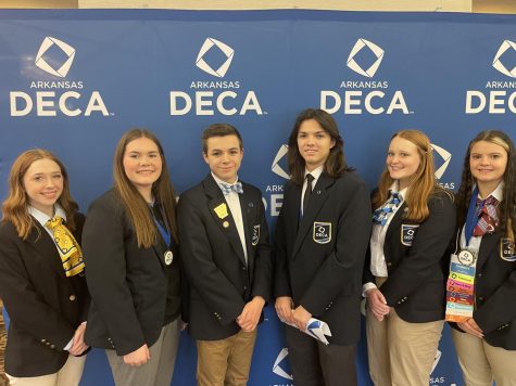 Juniors Mason Flynt and Eleanor Wesley pose with their fellow state officers after being elected to the 23-24 team on Feb 7 at the State Career Development Conference in Springdale. 