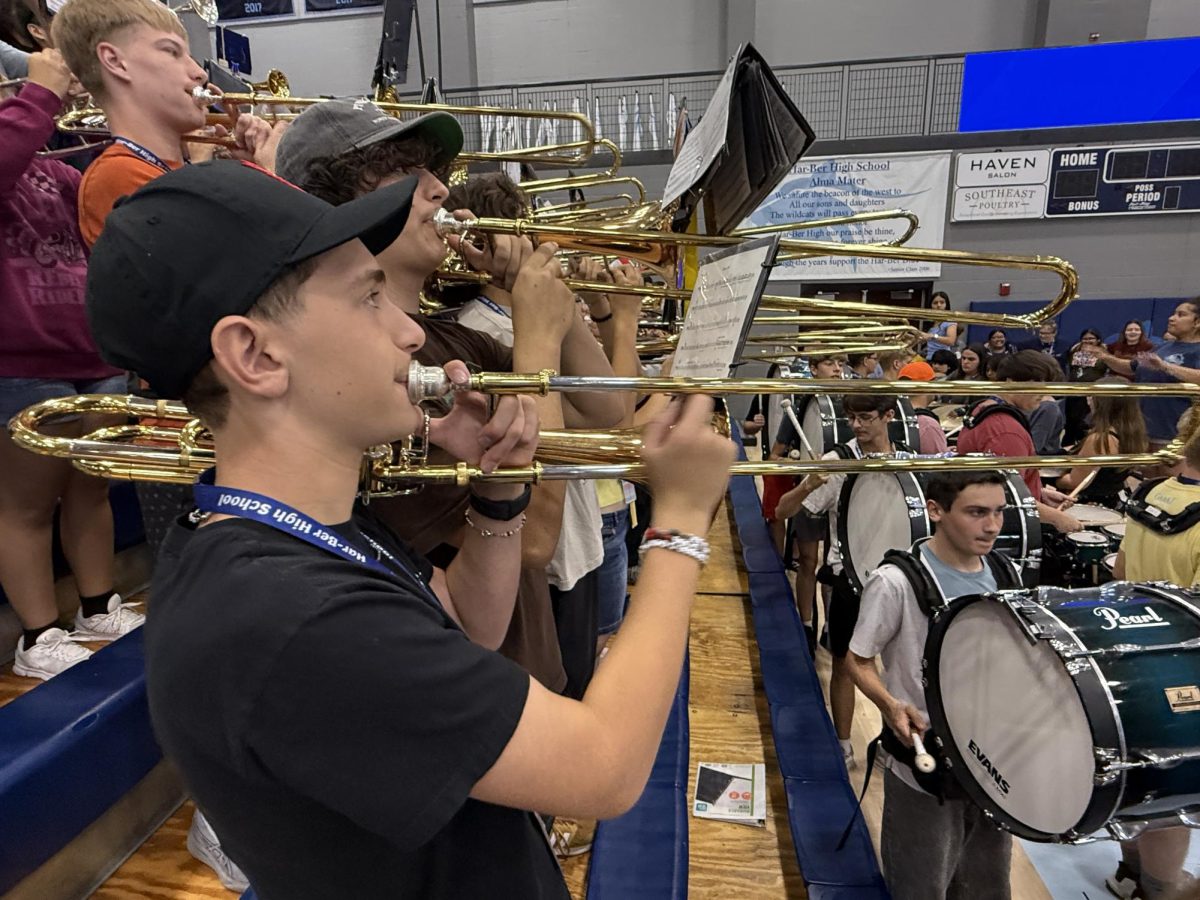 Trombone players perform the Fight Song at the Aug. 22 pep rally in Wildcat Arena. 
