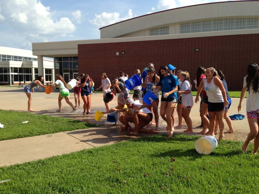 Ice bucket challenge soaks a nation